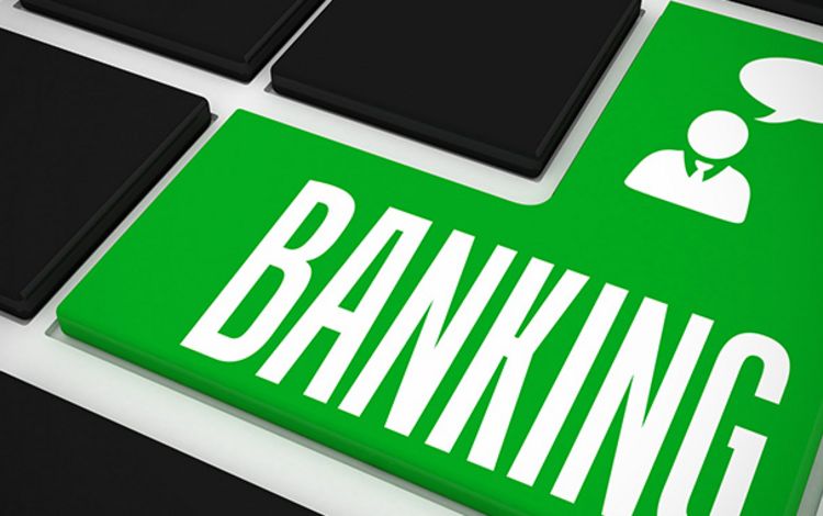PC-Tastatur mit grüner Taste "Banking"