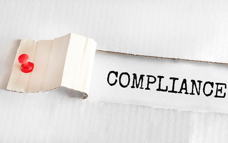 Karton mit der Aufschrift Compliance